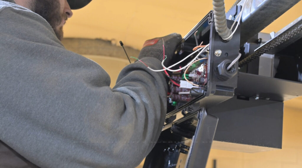 Garage door opener inspection due to an unbalanced garage door