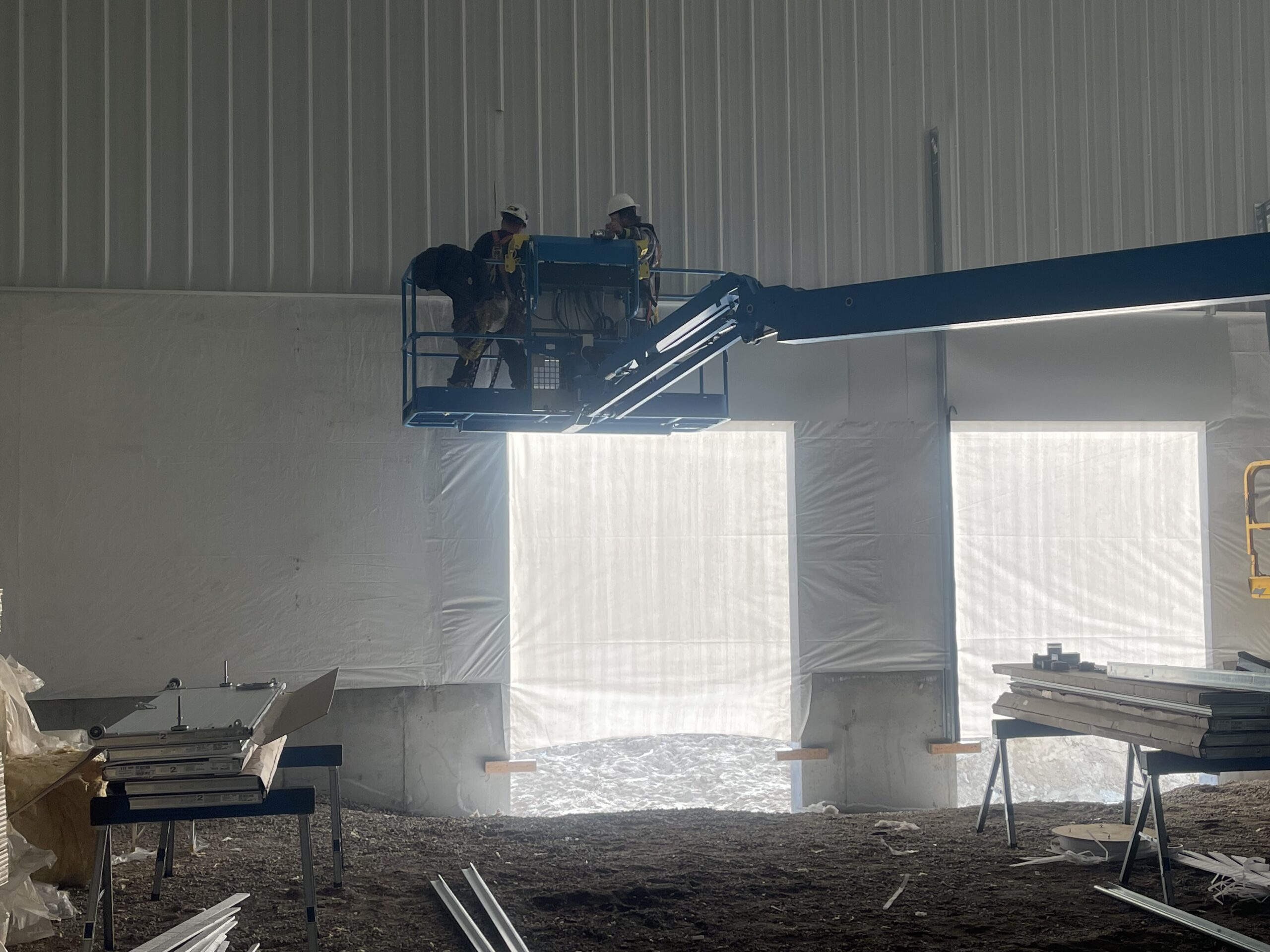 Quality Overhead Door technicians working on a garage door in Pocatello Idaho