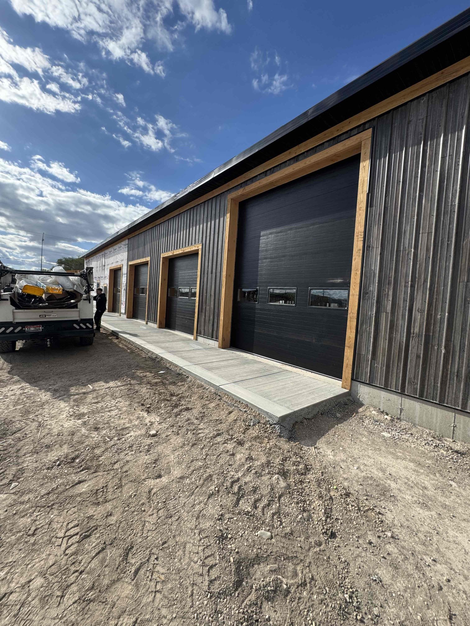 Sectional commercial overhead door installation for Carter Customs