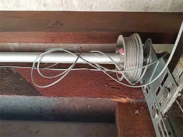 Frayed garage door cable needing repair in Pocatello Idaho